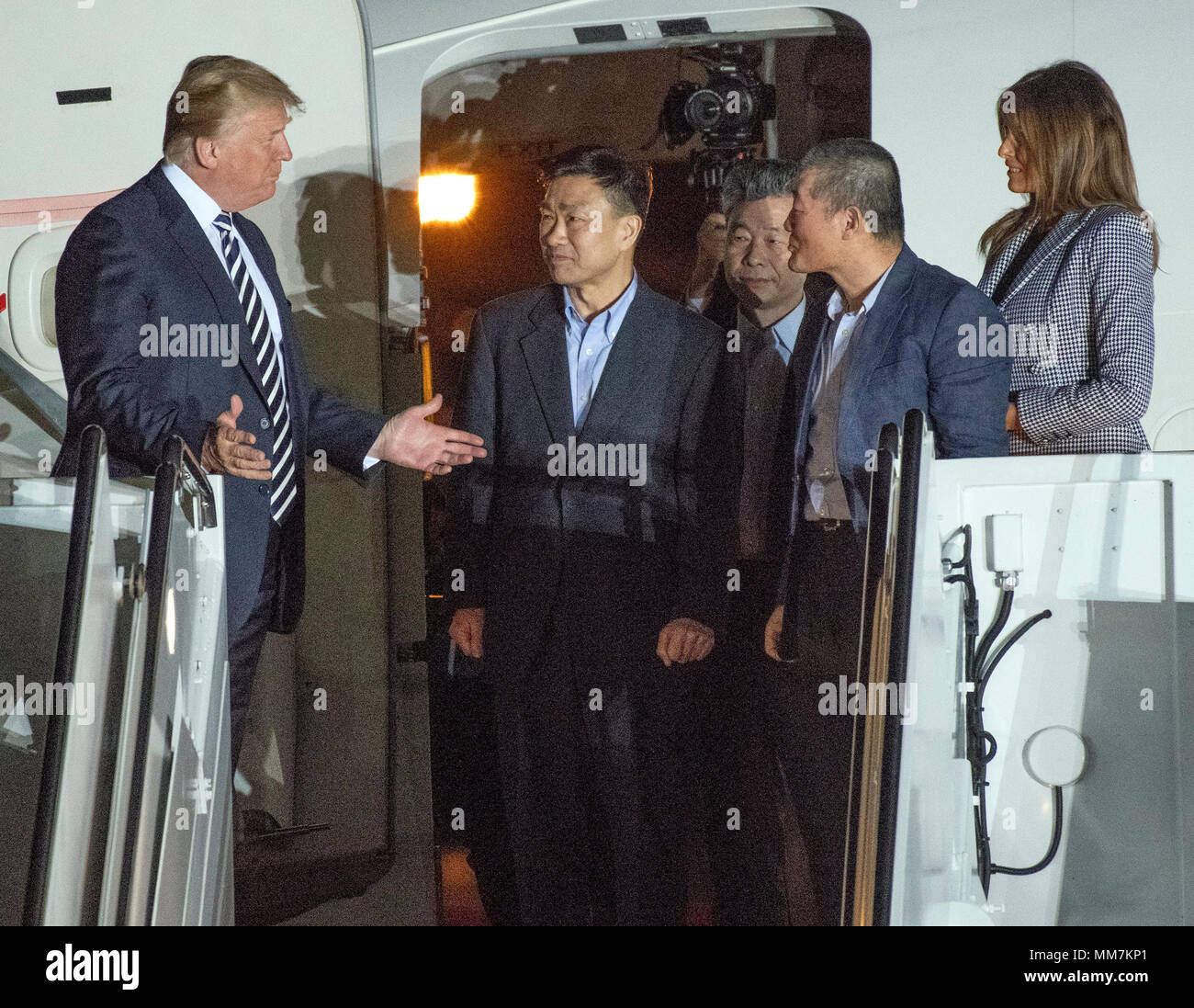 United States President Donald J. Trump welcomes Kim Dong Chul, Kim Hak Song and Tony Kim back to the US at Joint Base Andrews in Maryland on Thursday, May 10, 2018. The three men were imprisoned in North Korea for periods ranging from one and two years. They were released to US Secretary of State Mike Pompeo as a good-will gesture in the lead-up to the talks between President Trump and North Korean leader Kim Jong Un. Credit: Ron Sachs/CNP /MediaPunch Stock Photo