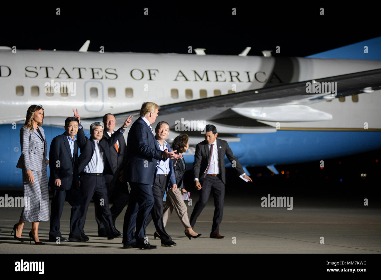 U.S. President Donald Trump and First Lady Melania Trump welcome home three American detainees freed by North Korea on arrival at Joint Base Andrews May 10, 2018 in Clinton, Maryland. The three include Kim Dong-chul, Tony Kim and Kim Hak-song released as a gesture of goodwill ahead of the planned meeting between Trump and North Korean leader Kim Jong-un. Stock Photo