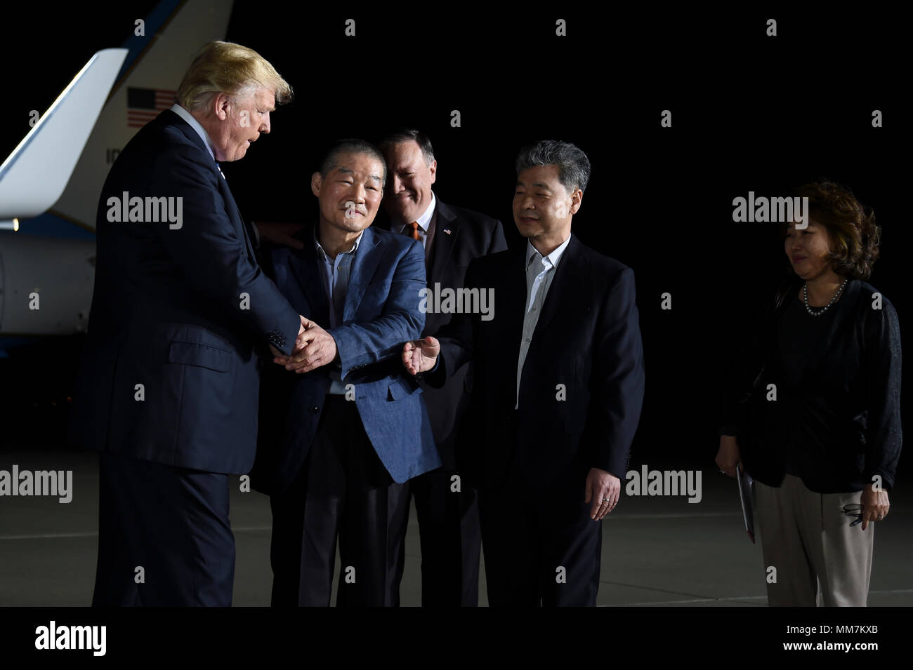 U.S. President Donald Trump and Secretary of State Mike Pompeo welcome home three American detainees freed by North Korea on arrival at Joint Base Andrews May 10, 2018 in Clinton, Maryland. The three include Kim Dong-chul, Tony Kim and Kim Hak-song released as a gesture of goodwill ahead of the planned meeting between Trump and North Korean leader Kim Jong-un. Stock Photo