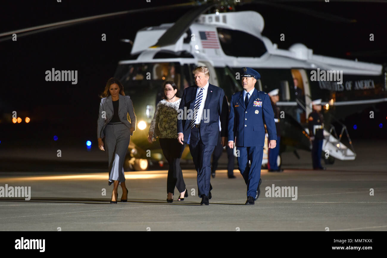 U.S. President Donald Trump and First Lady Melania Trump walk with Col. Casey D. Eaton, 89th Airlift Wing commander and his wife Lisa Eaton as they arrive to welcome home three American detainees freed by North Korea at Joint Base Andrews May 10, 2018 in Clinton, Maryland. The three include Kim Dong-chul, Tony Kim and Kim Hak-song released as a gesture of goodwill ahead of the planned meeting between Trump and North Korean leader Kim Jong-un. Stock Photo