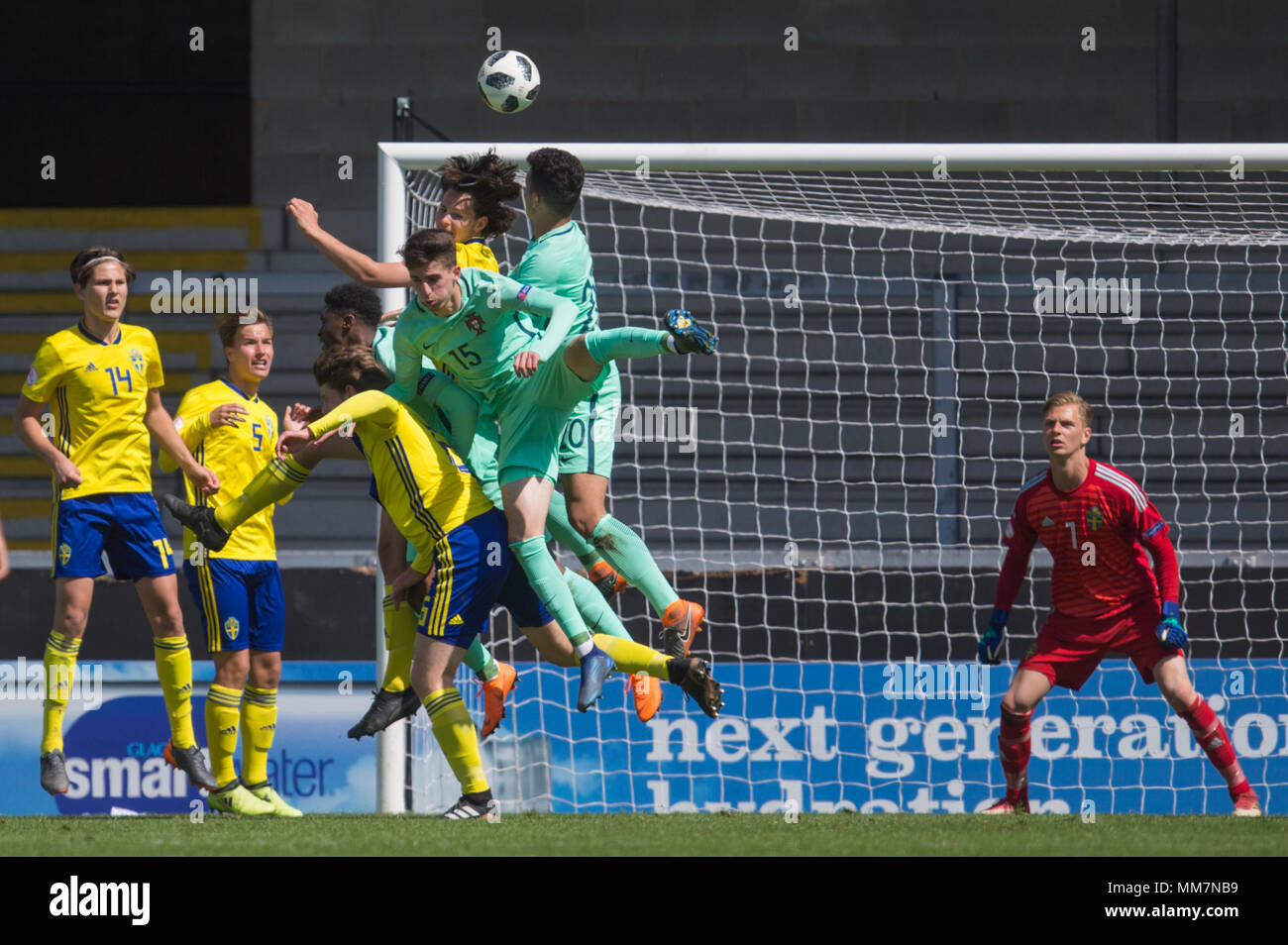 Bernardo Silva (Portugal) and Goncalo Ramos (Portugal) try to get on a high ball during the 2018 UEFA European Under-17 Championship Group B match between Sweden and Portugal at Pirelli Stadium on May 10th 2018 in Burton upon Trent, England. (Photo by Richard Burley/phcimages.com) Stock Photo