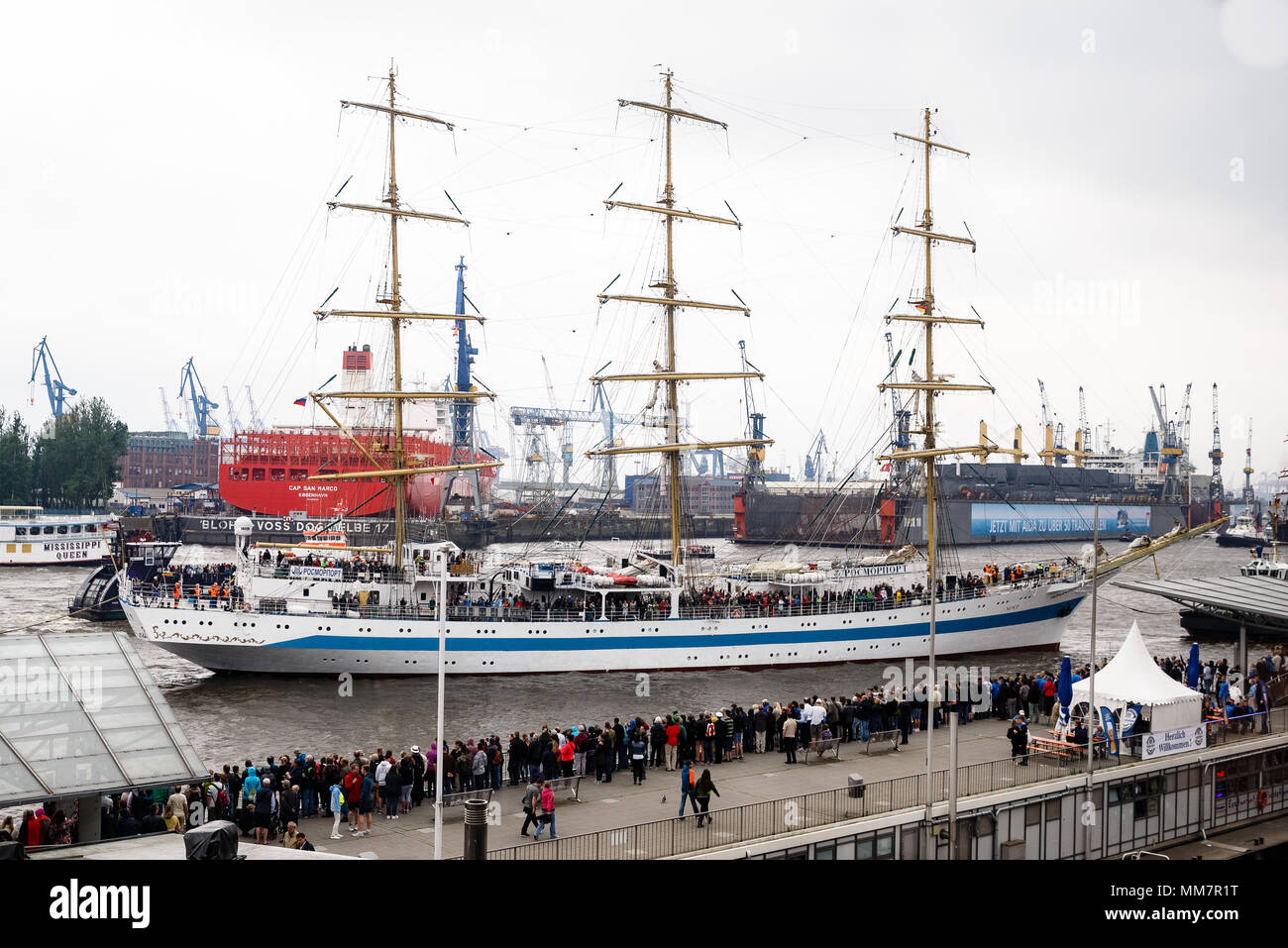 10 May 2018, Germany, Hamburg: Together with more than 100 ships of all sizes, the Russian tall ship parades on the River Elbe for the inauguration of the anniversary of Hamburg's Harbour. Approximately one million visitors are expected to attend the largest Harbour festivity in the world. The festivities will end on 13 May 2018 with a large outlet parade. Photo: Markus Scholz/dpa Stock Photo