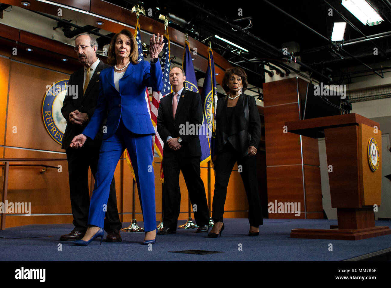 Washington, USA. 10th May, 2018. House of Representatives Democratic Leader Nancy Pelosi, Democrat of California, walks off the stage as reporters ask questions following her weekly news conference on Capitol Hill in Washington, DC on May 10, 2018. Credit: The Photo Access/Alamy Live News Stock Photo