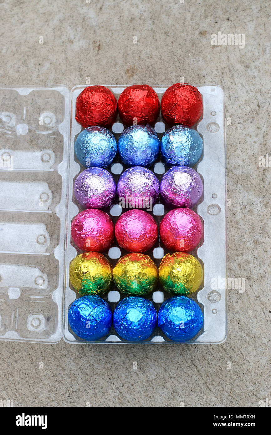 Colourful Chocolate Eggs on plastic carton Stock Photo Alamy