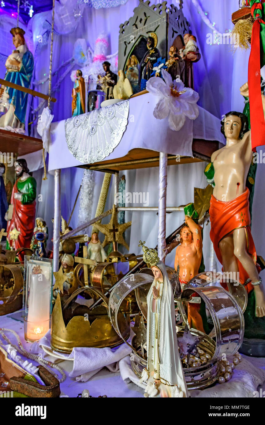 Brazilian religious altar mixing elements of umbanda, candomblÃ© and catholicism in the syncretism present in the local culture and religion Stock Photo