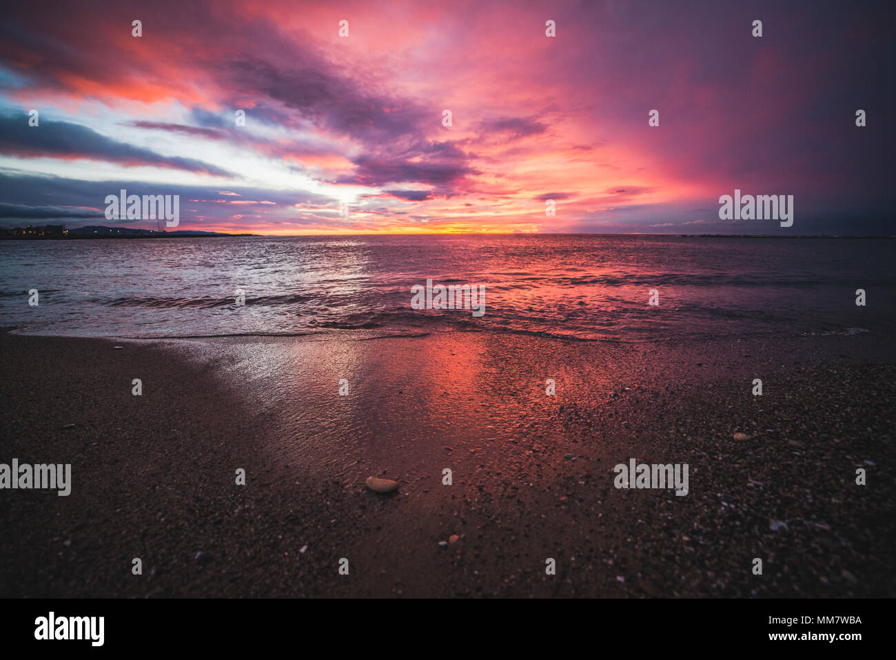 Beautiful colorful seascape at sunrise Stock Photo - Alamy