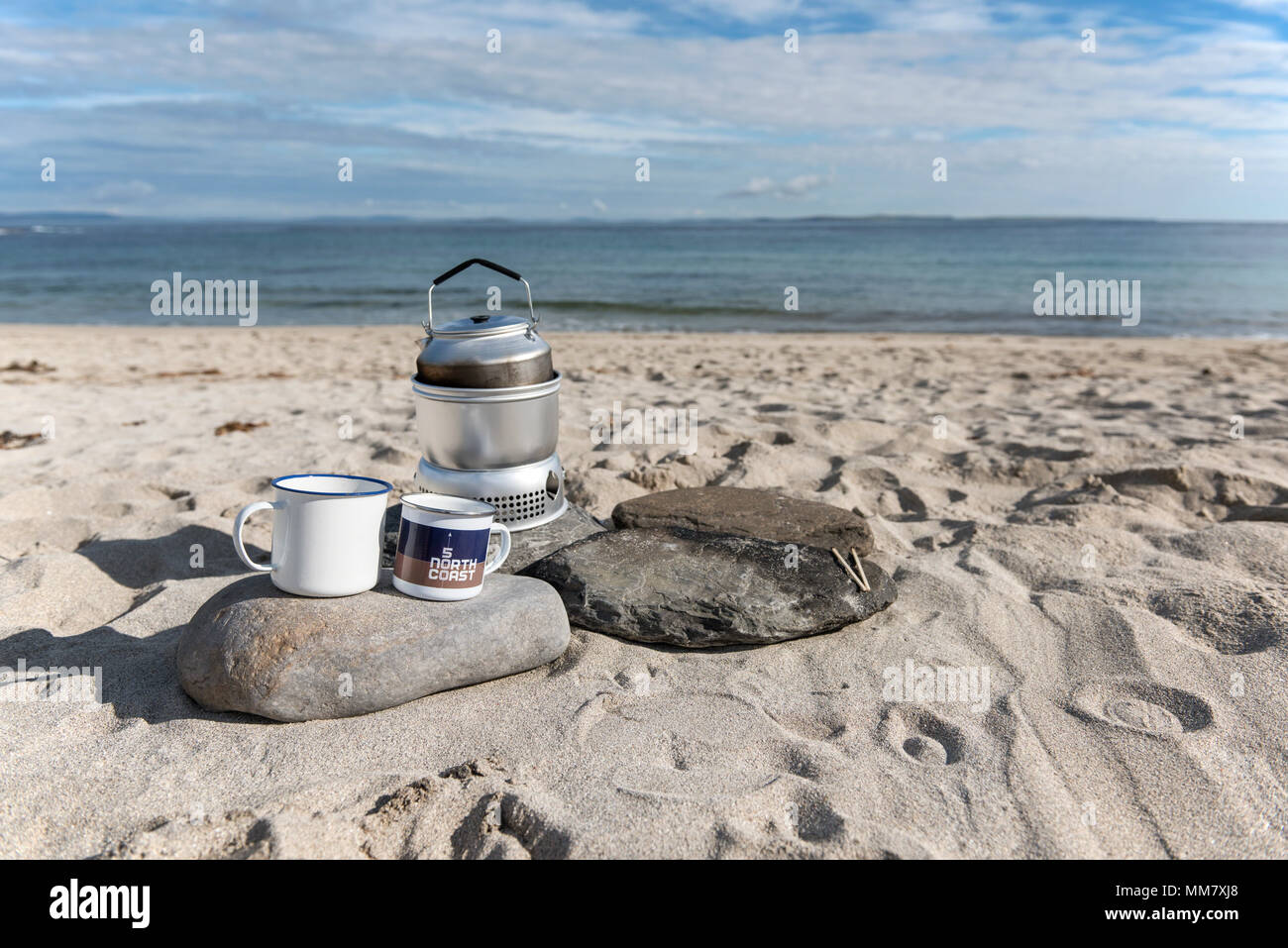 Wild camping on the beach at Sannick Bay, Caithness, Highlands, Scotland. Making a brew. Stock Photo