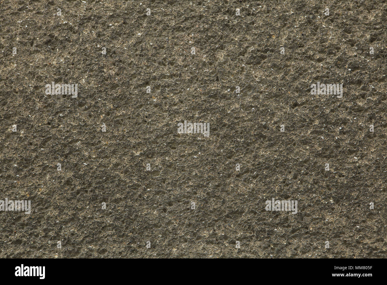 Rough unpainted concrete wall. Background texture. Stock Photo