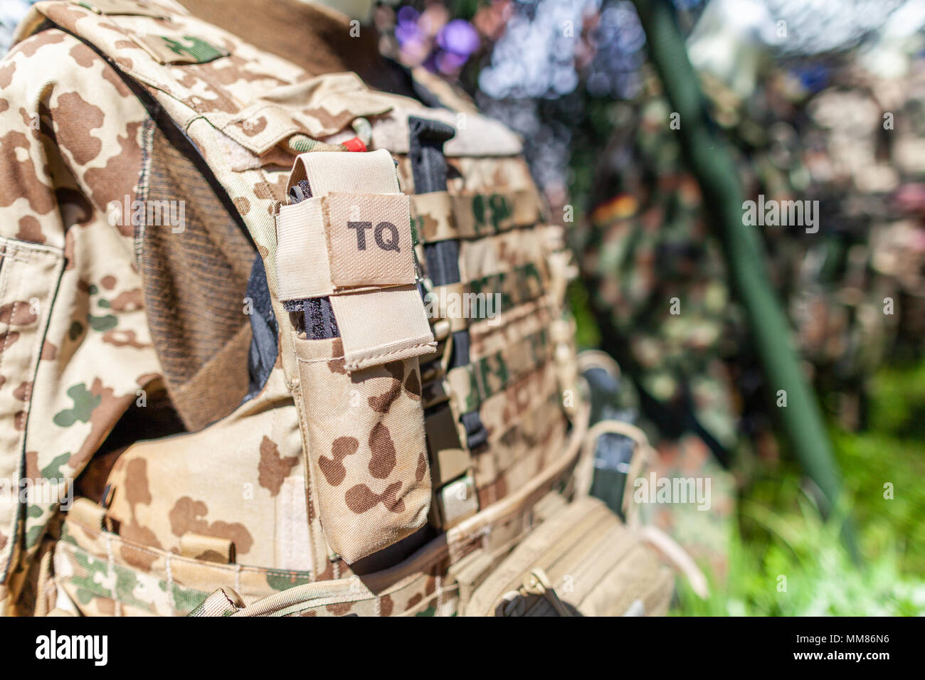 TQ tourniquet bag on a german soldier desert uniform Stock Photo