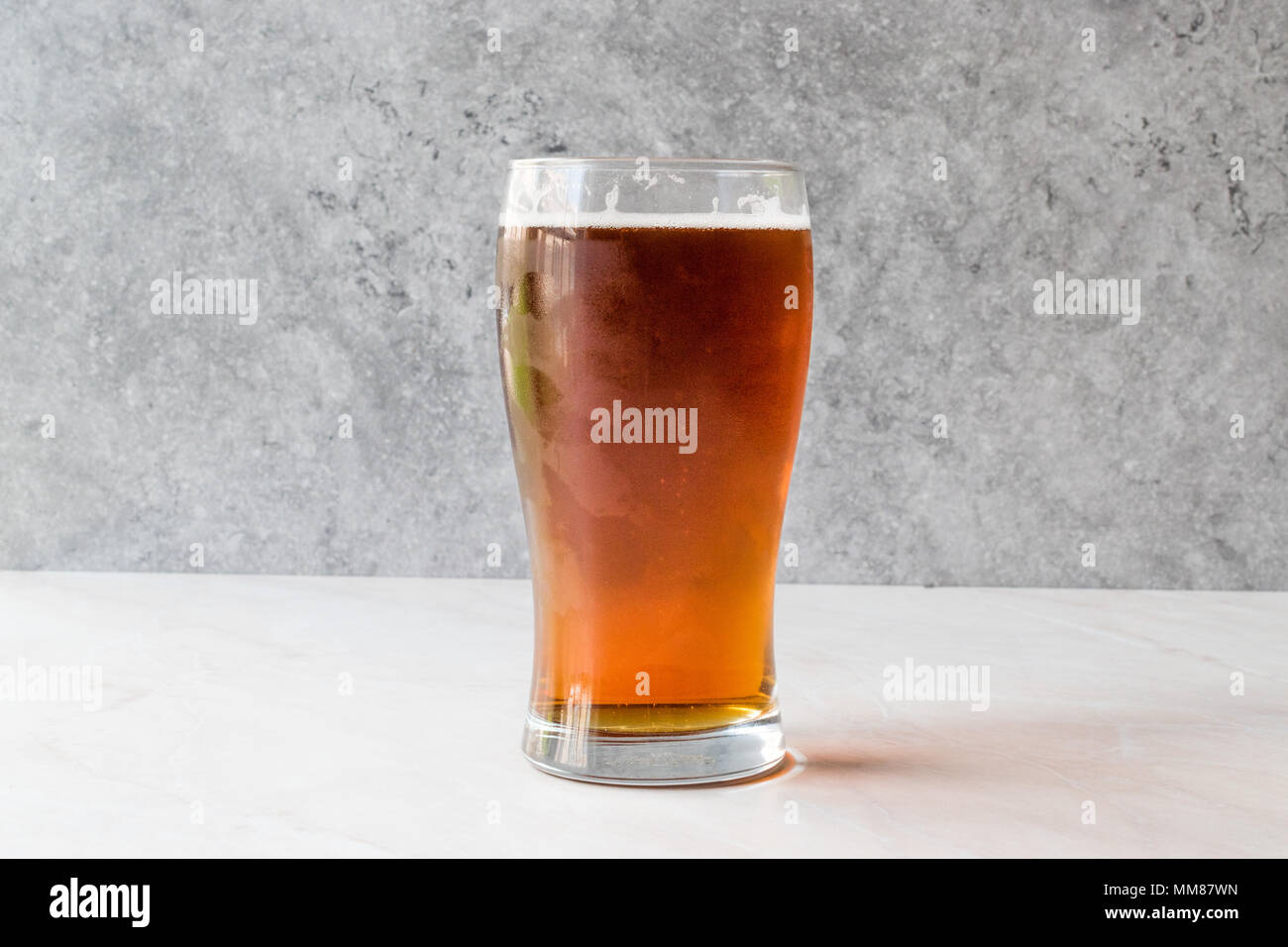 Download Cool Refreshing Red Amber Beer In Glass Beverage Concept Stock Photo Alamy Yellowimages Mockups
