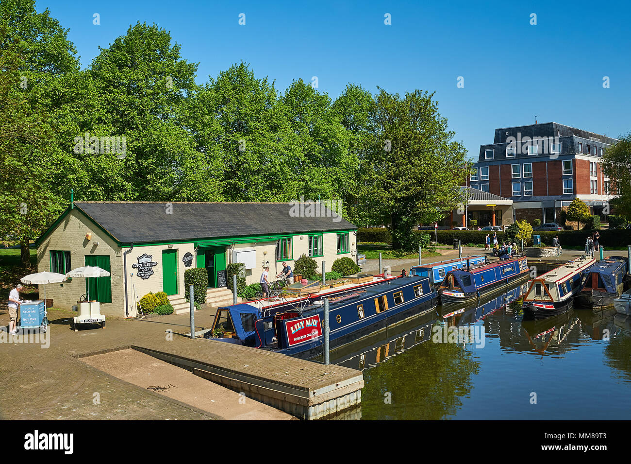 Stratford upon Avon and canal narrowboats moored on the River Avon in the centre of the town. Stock Photo