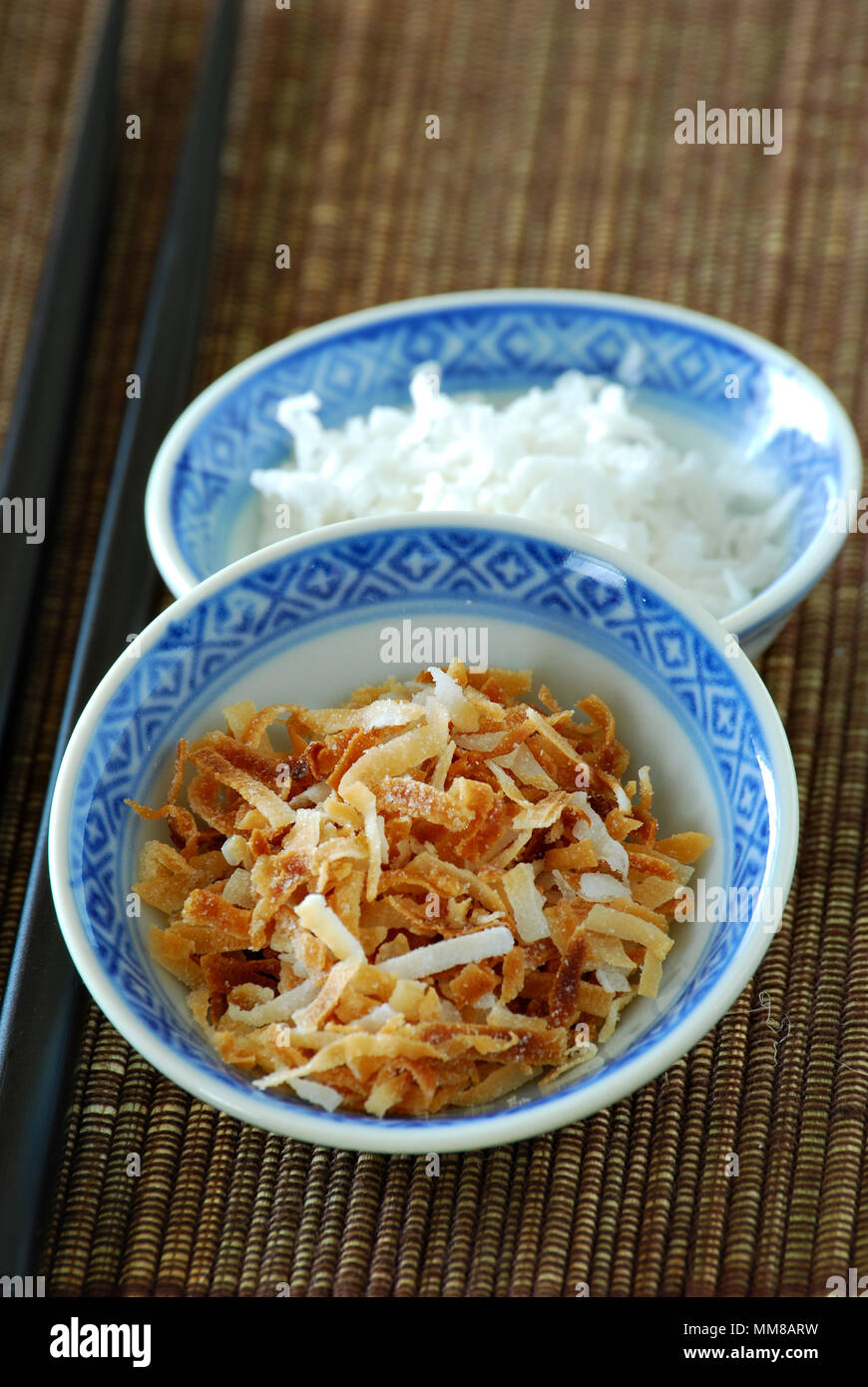 raw and toasted coconut Stock Photo - Alamy