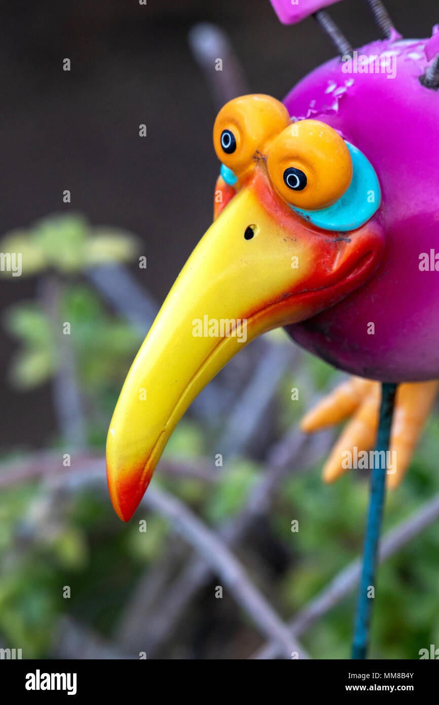 Whimsical Garden Bird Decoration Stock Photo