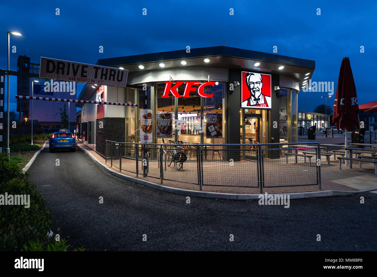 09 May 2018 - New-build KFC with Drive Thru and Lidl Store at Crosfield's Roundabout, Warrington, Cheshire, England, UK Stock Photo