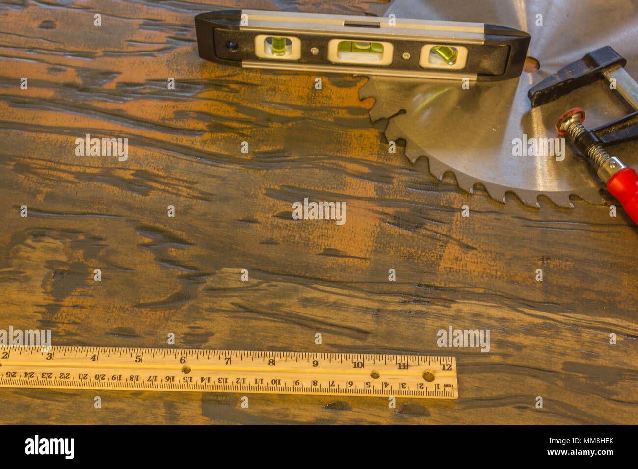 saw blade and other tools on wood Stock Photo