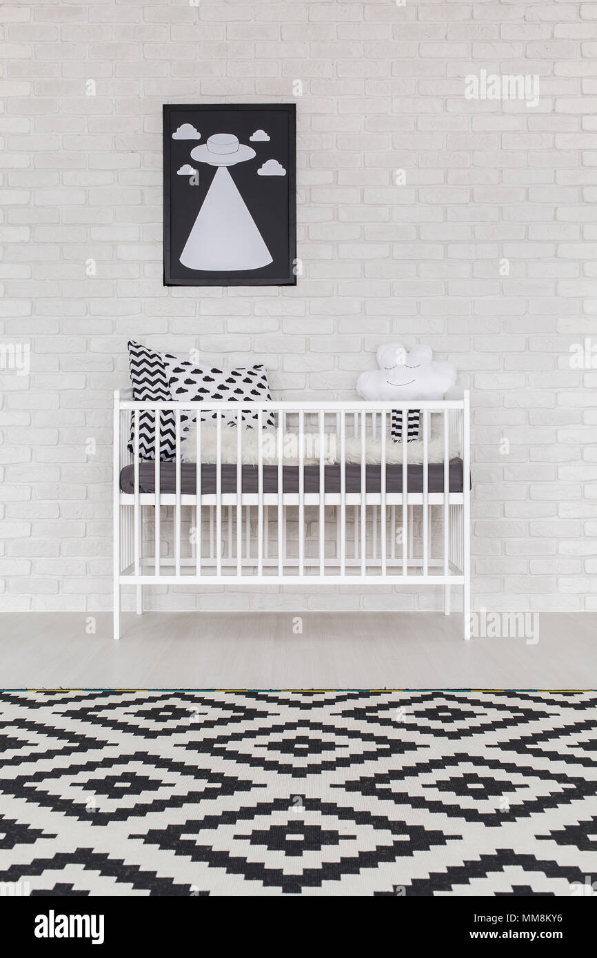 Shot Of A Crib In A Black And White Room Stock Photo 184588074