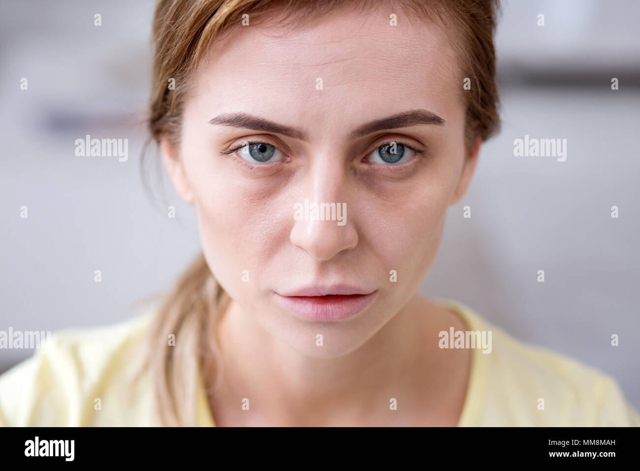 Portrait of a pale exhausted woman Stock Photo Alamy