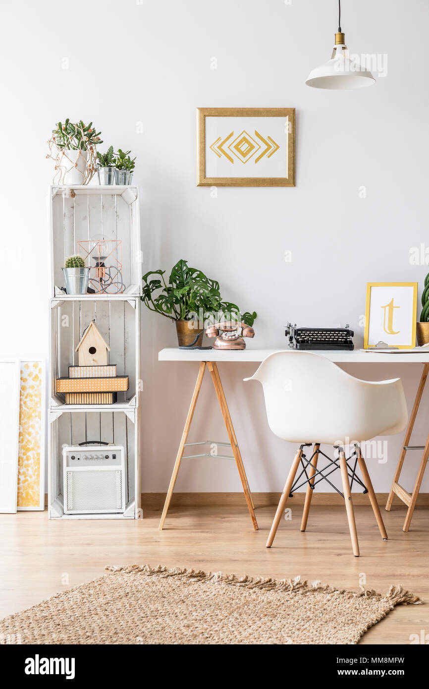 Modern home office area with desk and armchair Stock Photo Alamy
