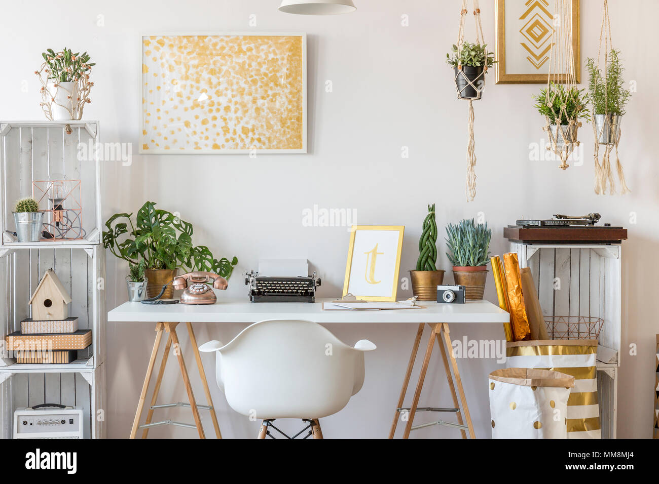 Well-lighted room interior with gold design Stock Photo - Alamy