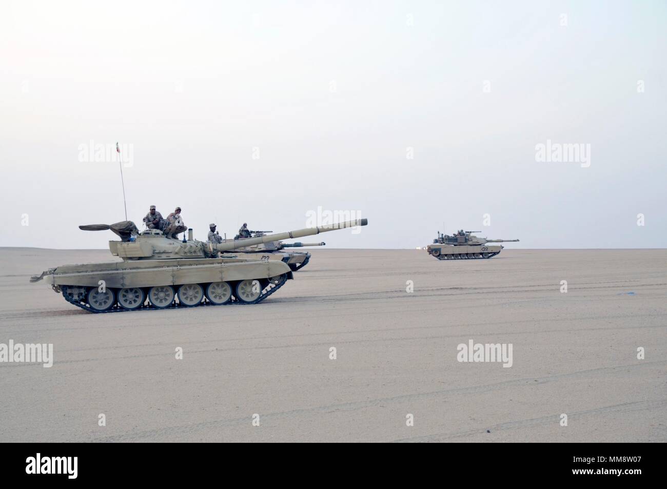 Udairi Range, Kuwait Kuwaiti and US tanks prepare to move out during