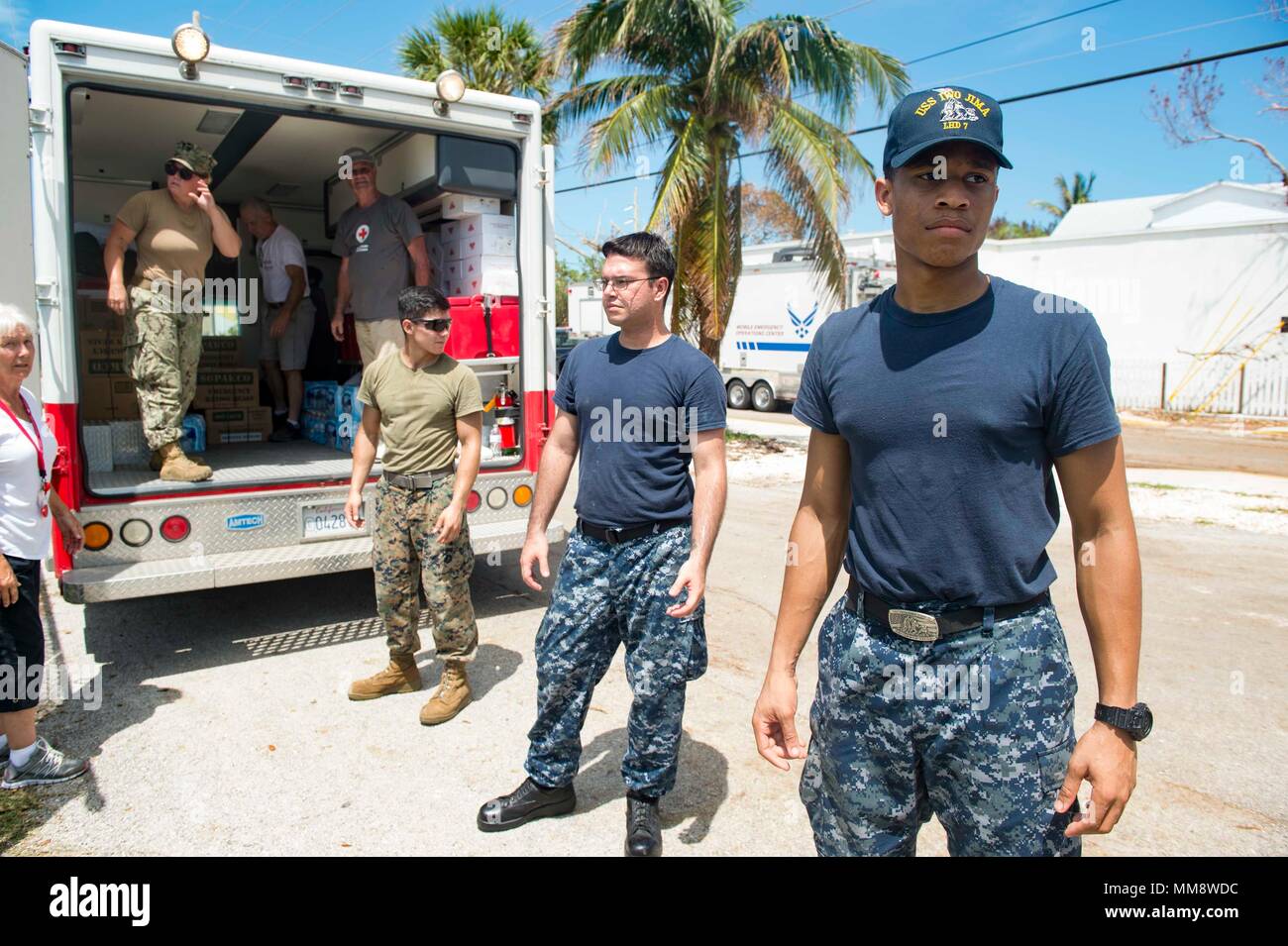170915-N-YL073-0260 KEY WEST, Fla. (Sept. 15, 2017) Sailors assigned to USS New York (LPD 21), USS Iwo Jima (LHD 7), and Assault Craft Unit (ACU) 2, and Army National Guard Soldiers, prepare to give food and water to American Red Cross volunteers during humanitarian relief efforts following Hurricane Irma's landfall in Key West, Florida. The Department of Defense is supporting Federal Emergency Management Agency, the lead federal agency, in helping those affixed by Hurricane Irma to minimize suffering and as one component of the overall whole-of-government response efforts. (U.S. Navy photo by Stock Photo