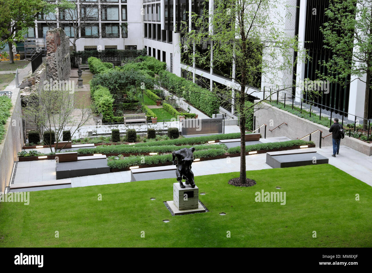 View of St Alphage Garden Minotaur and urban Salters Garden design from highwalk at 2 London Wall Place in spring in City of London UK  KATHY DEWITT Stock Photo