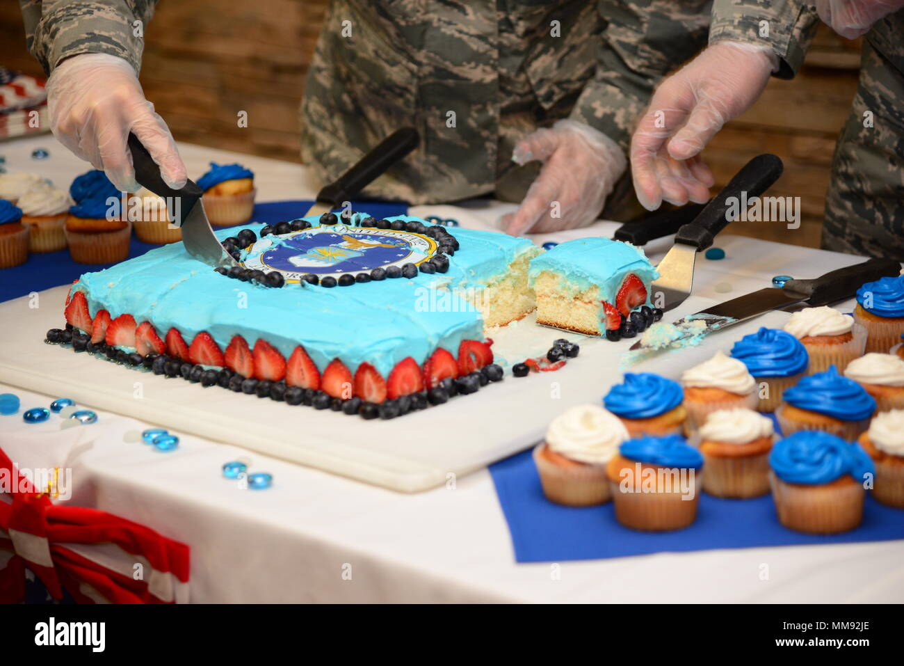 U S Airmen From The 355th Force Support Squadron Cut And Serve