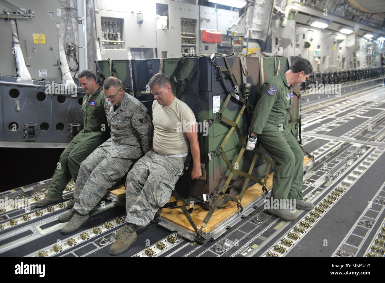 U S Air Force Tech Sgt Taylor Grover Loadmaster 183rd Airlift Wing Mississippi Air National Guard Staff Sgt Andrew Norton Air Transportation Specialist 157th Logistic Readiness Squadron New Hampshire Ang Staff Sgt