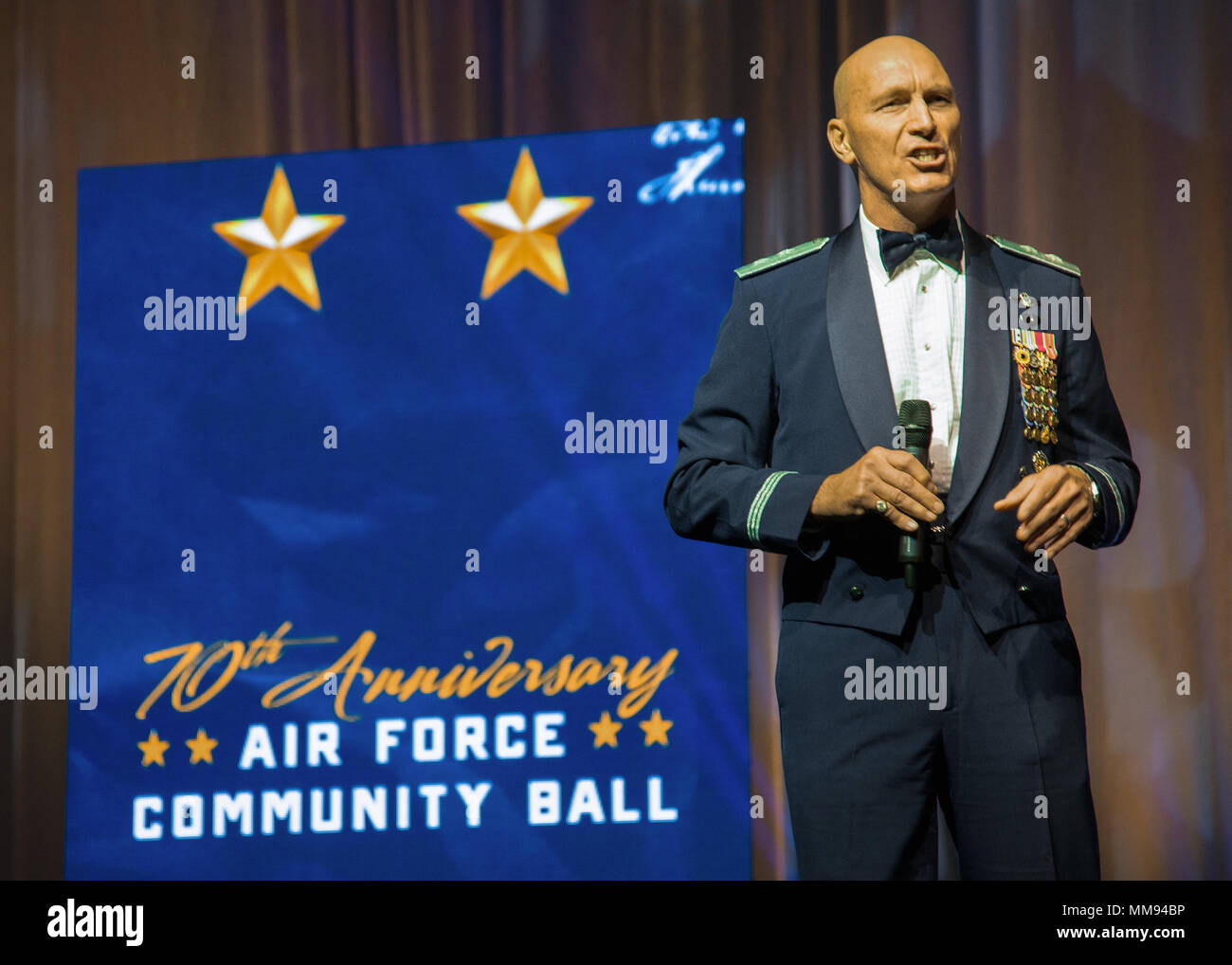 Major General Timothy M. Zadalis, United States Air Forces in Europe-Air Forces in Africa Vice Commander, speaks at the 70th Anniversary Community Air Force Ball Sept. 16, 2017, at Vance Air Force Base in Enid, Okla. Zadalis began his Air Force career in 1984 as a student in specialized undergraduate pilot training at Vance. (U.S. Air Force photo by Airman Zachary Heal) Stock Photo