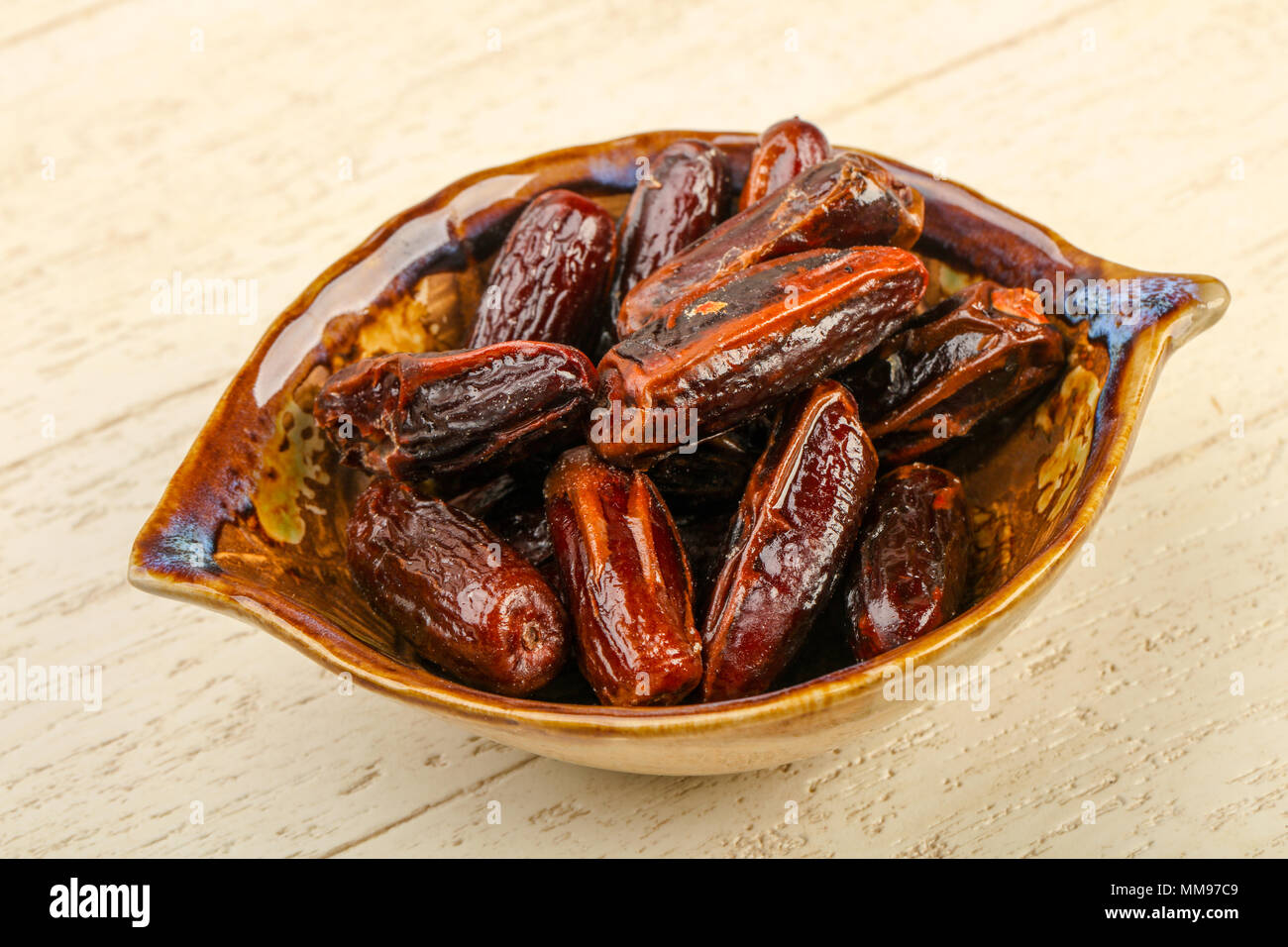 Sweet dates fruit heap in the bowl Stock Photo Alamy