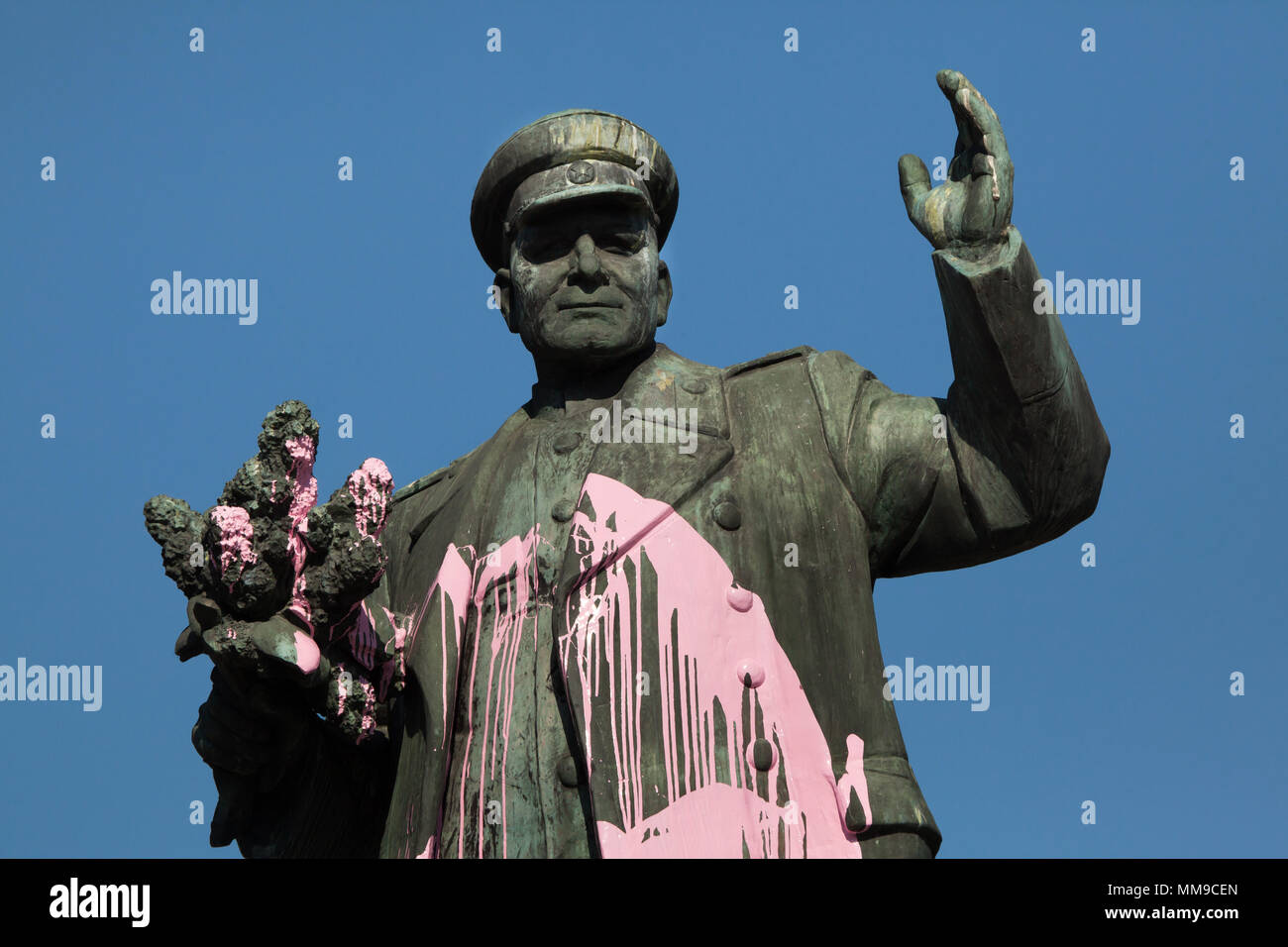 Monument to Soviet military commander Ivan Konev vandalized with pink paint in Prague, Czech Republic, on 8 May 2018. Bronze statue by Czech sculptor Zdeněk Krybus was unveiled in 1980 in Dejvice district to commemorate the liberation of Prague by the 1st Ukrainian Front of the Red Army under command of Ivan Konev in May 1945 in the last days of World War II. Stock Photo