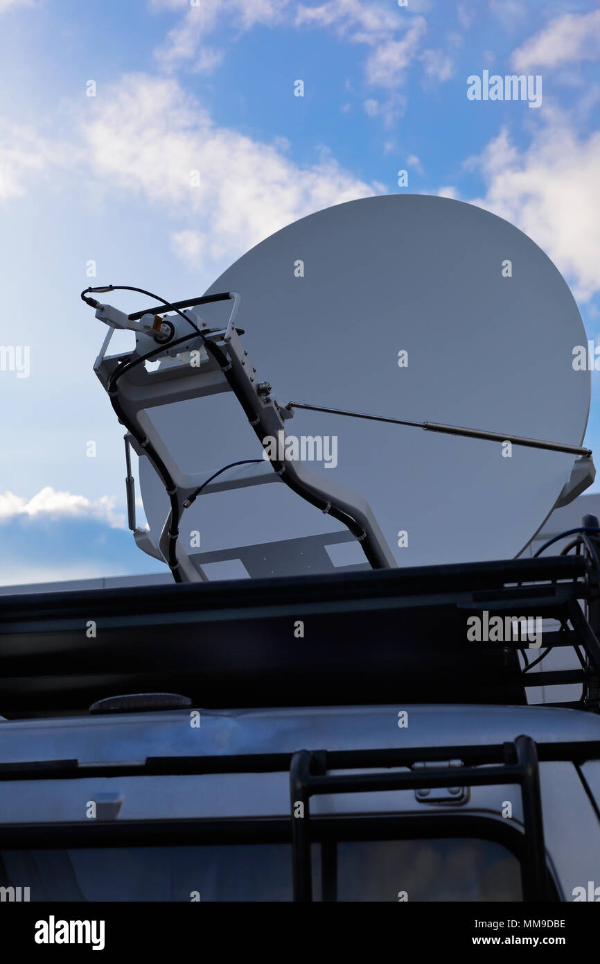 Television news van with a satellite dish. Stock Photo