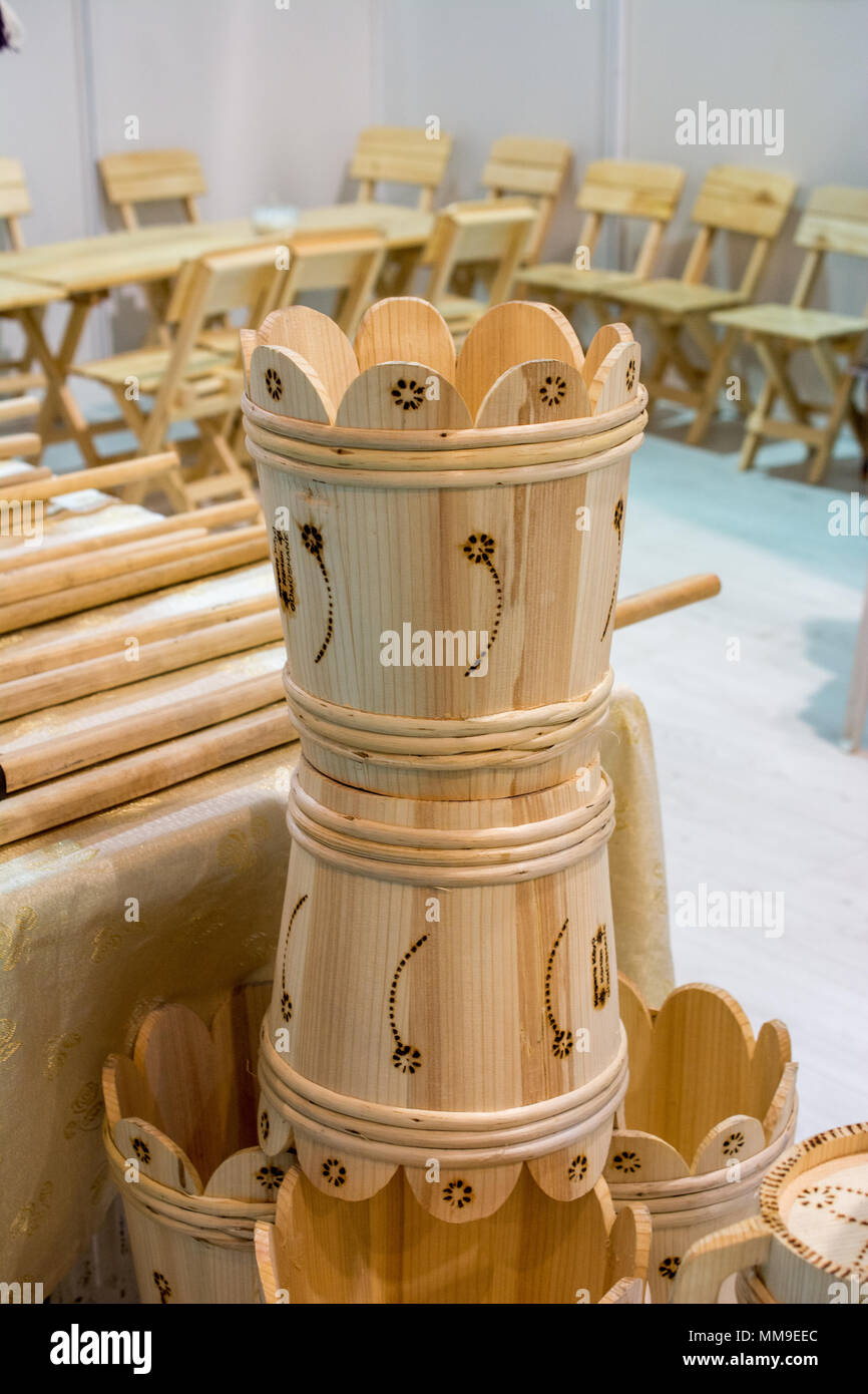 Set of buckets made of wood in a market place Stock Photo Alamy