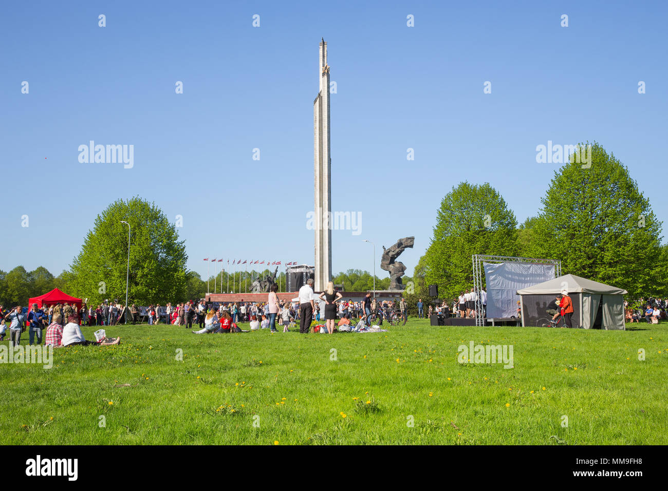 Latvia, city Riga, Victory park, May 9, celebration 73 year after world war 2, peoples, flowers and sun. Travel photo 2018 Stock Photo