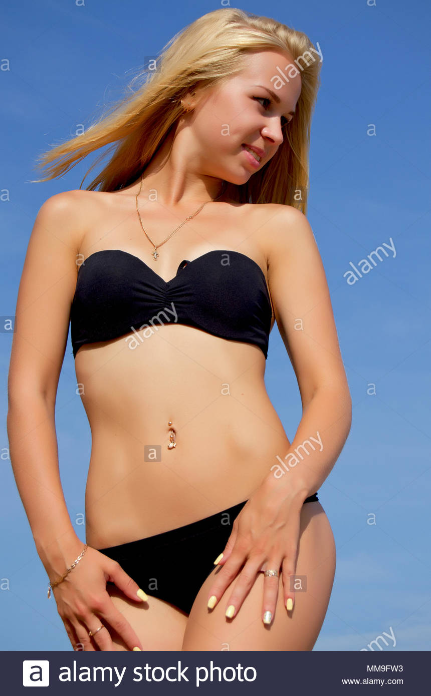 Sexy young girl in bikini sunning Stock Photo: 184606831 - Alamy