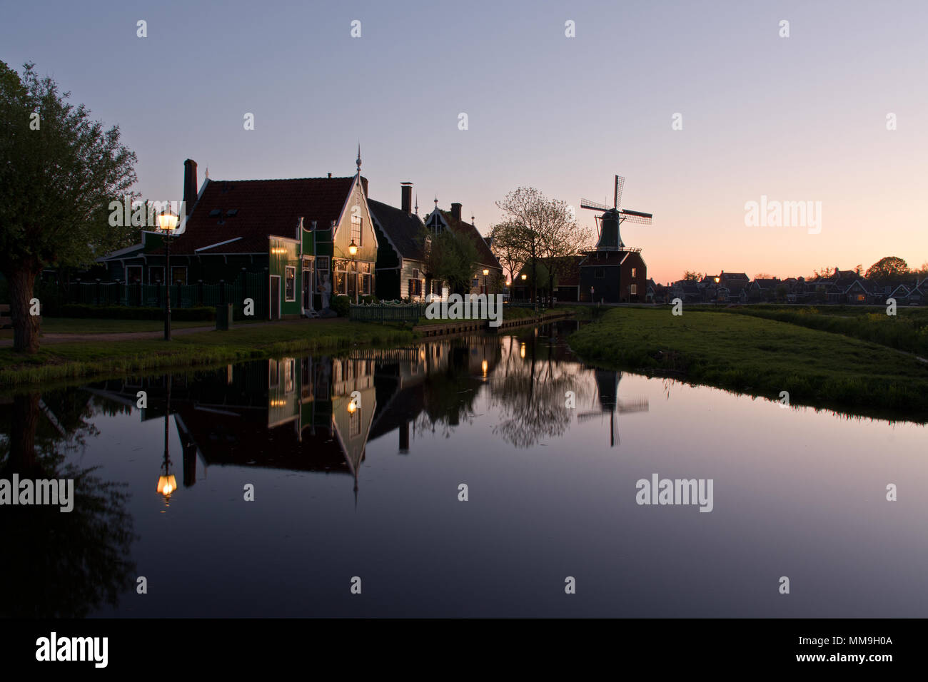 Water reflections in Zaanse Schans at dusk, The Netherlands Stock Photo