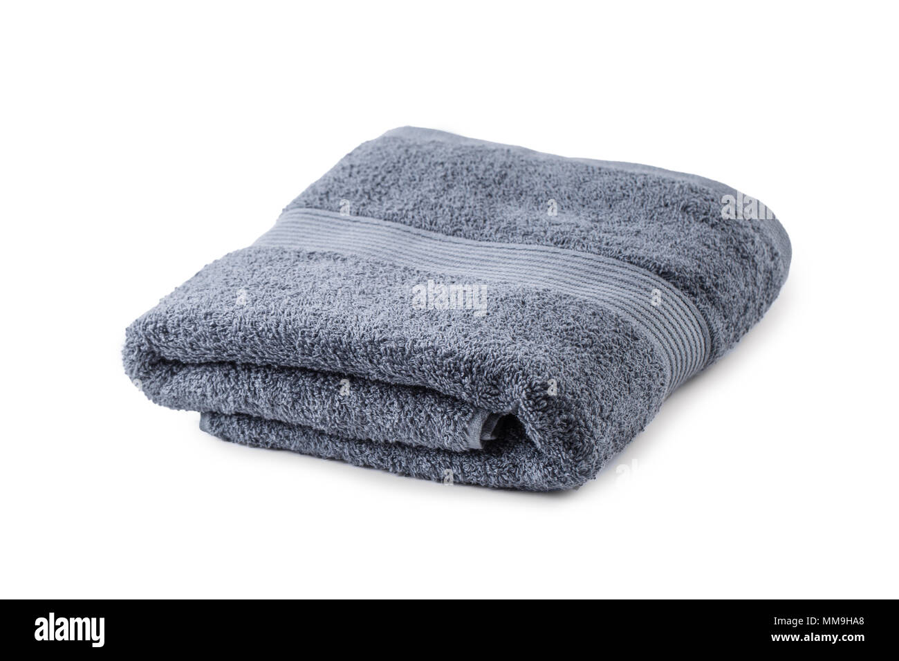 Gray towel isolated on white background. Stock Photo