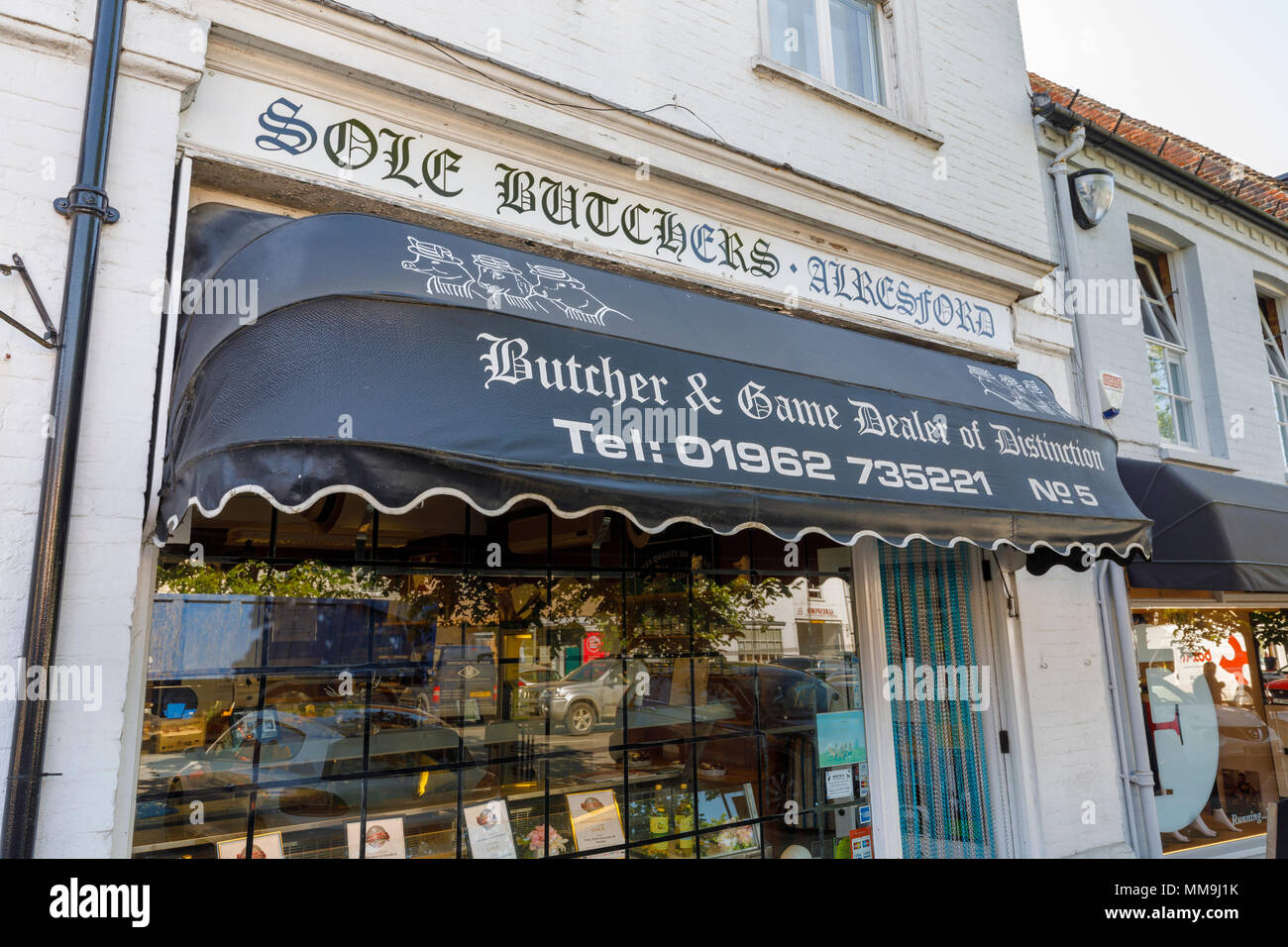 Sole Butchers, a traditional butcher and game shop in Broad Street, New Alresford, a small town or village in Hampshire, southern England, UK Stock Photo