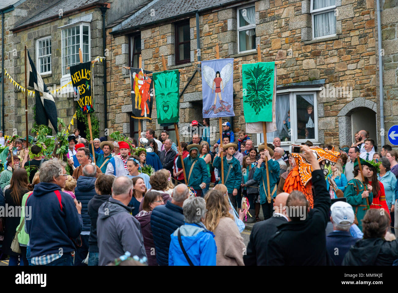 Editorial: Unknown members of the public, potential logo and other trademarks. Helston, Cornwall, UK, 08/05/2018. Dancers make their way through the s Stock Photo