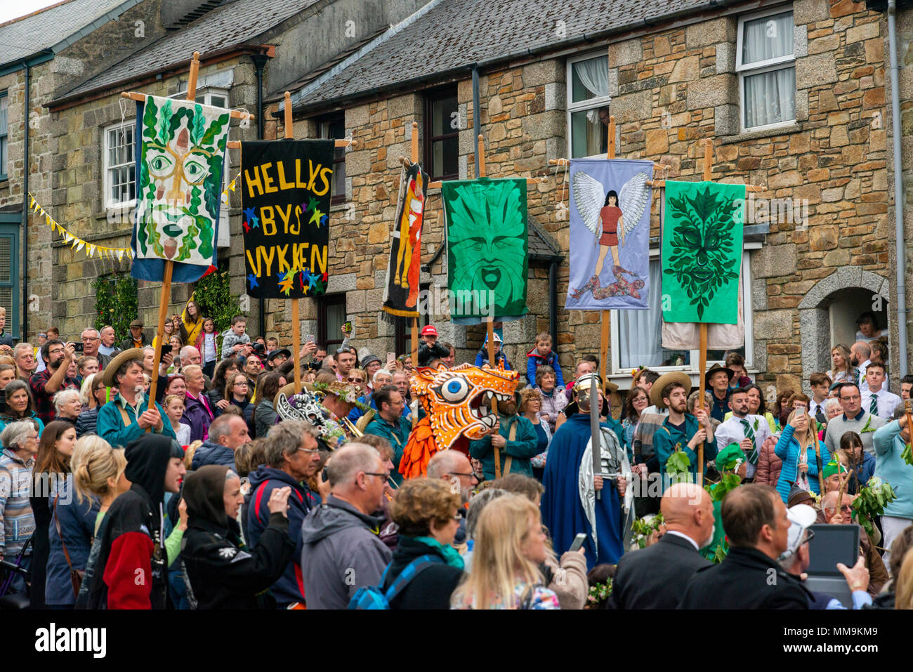 Editorial: Unknown members of the public, potential logo and other trademarks. Helston, Cornwall, UK, 08/05/2018. Dancers make their way through the s Stock Photo