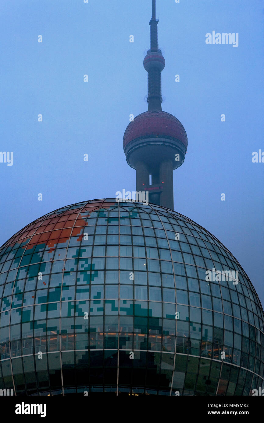 China.Shanghai: Oriental Pearl Tower and the globe sphere of Shanghai´s International Convention Centre. Pudong Stock Photo