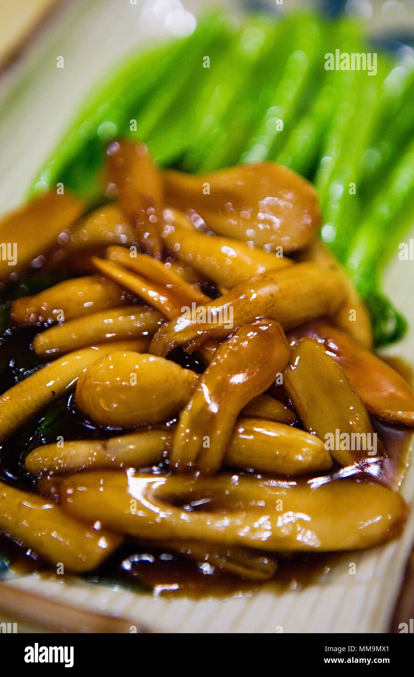 China.Shanghai: Vegetables. Chinese broccoli  and Mushrooms Stock Photo