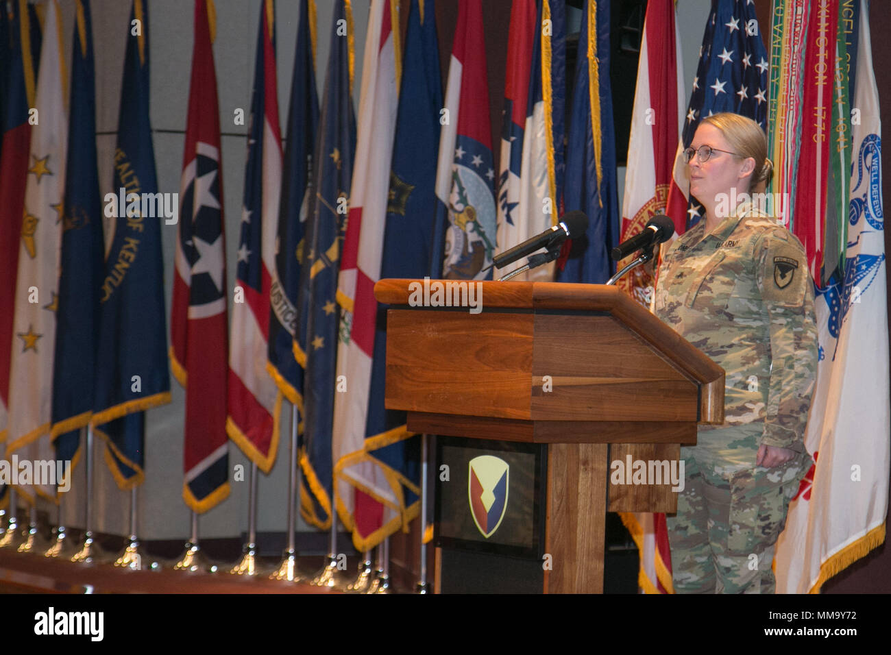 U.S. Army Sgt. Amy Mahoney, a member of the Army Materiel Command's Band, sings the National Anthem during the Hispanic-American Heritage Month Observance celebration Sept. 25, 2017 at Redstone Arsenal, Alabama. The guest speaker for the event was Christine Chavez, granddaughter of labor leader and civil rights activist Cesar Chavez. (U.S. Army photo by Sgt. 1st Class Teddy Wade) Stock Photo