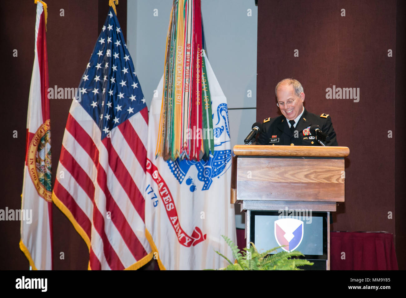 U.S. Army Maj. Gen. Allan Elliott, Chief of Staff for Army Materiel Command, introduces the keynote speaker Mrs. Christine Chavez, during the Hispanic-American Heritage Month Observance Sept. 25, 2017 at Redstone Arsenal, Alabama.  Chavez is the granddaughter of labor leader and civil rights activist Cesar Chavez.  (U.S. Army photo by Sgt. 1st Class Teddy Wade) Stock Photo