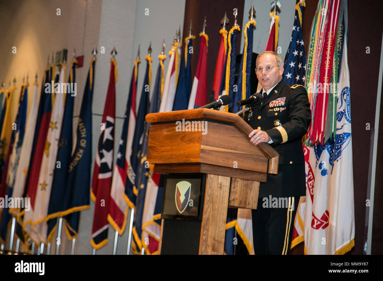 U.S. Army Maj. Gen. Allan Elliott, Chief of Staff for Army Materiel Command, introduces the keynote speaker Mrs. Christine Chavez, during the Hispanic-American Heritage Month Observance Sept. 25, 2017 at Redstone Arsenal, Alabama.  Chavez is the granddaughter of labor leader and civil rights activist Cesar Chavez.  (U.S. Army photo by Sgt. 1st Class Teddy Wade) Stock Photo