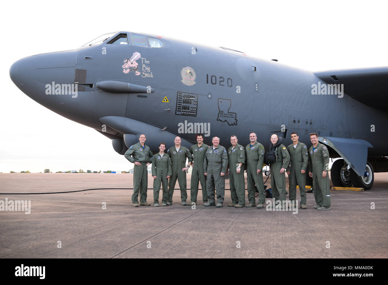 A B-52 Stratofortress aircrew poses for a photo after landing at Fairford Royal Air Force Base, Sept. 22, 2017. The aircrew participated in SERPENTEX 17, a coalition exercise that brought teams together from the U.S., U.K., France and Canada. (U.S. Air Force photo/Staff Sgt. Benjamin Raughton) Stock Photo