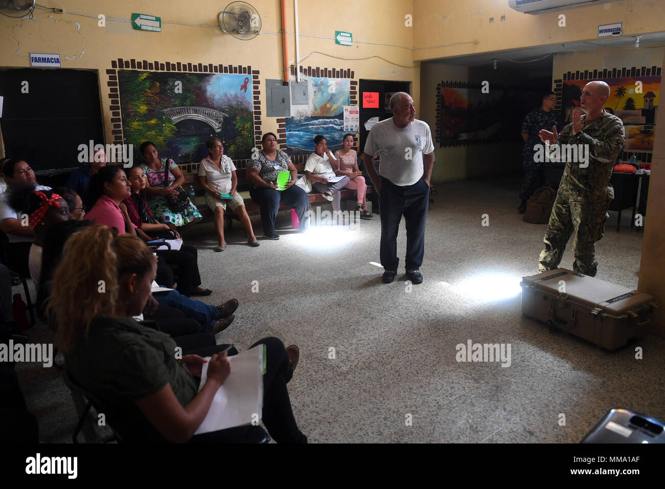 170926-N-BK435-0023 PUERTO BARRIOS, Guatemala (Sept. 26, 2017) Lt. Cmdr. Ian Sutherland, technical director for the Navy Entomology Center of Excellence, gives an entomology lecture to Guatemalan medical professionals, during a subject matter exchange at Puerto Barrios Health Clinic, in support of Southern Partnership Station 17. SPS 17 is a U.S. Navy deployment executed by U.S. Naval Forces Southern Command/U.S. 4th Fleet, focused on subject matter expert exchanges with partner nation militaries and security forces in Central and South America. (U.S. Navy photo by Mass Communication Specialis Stock Photo