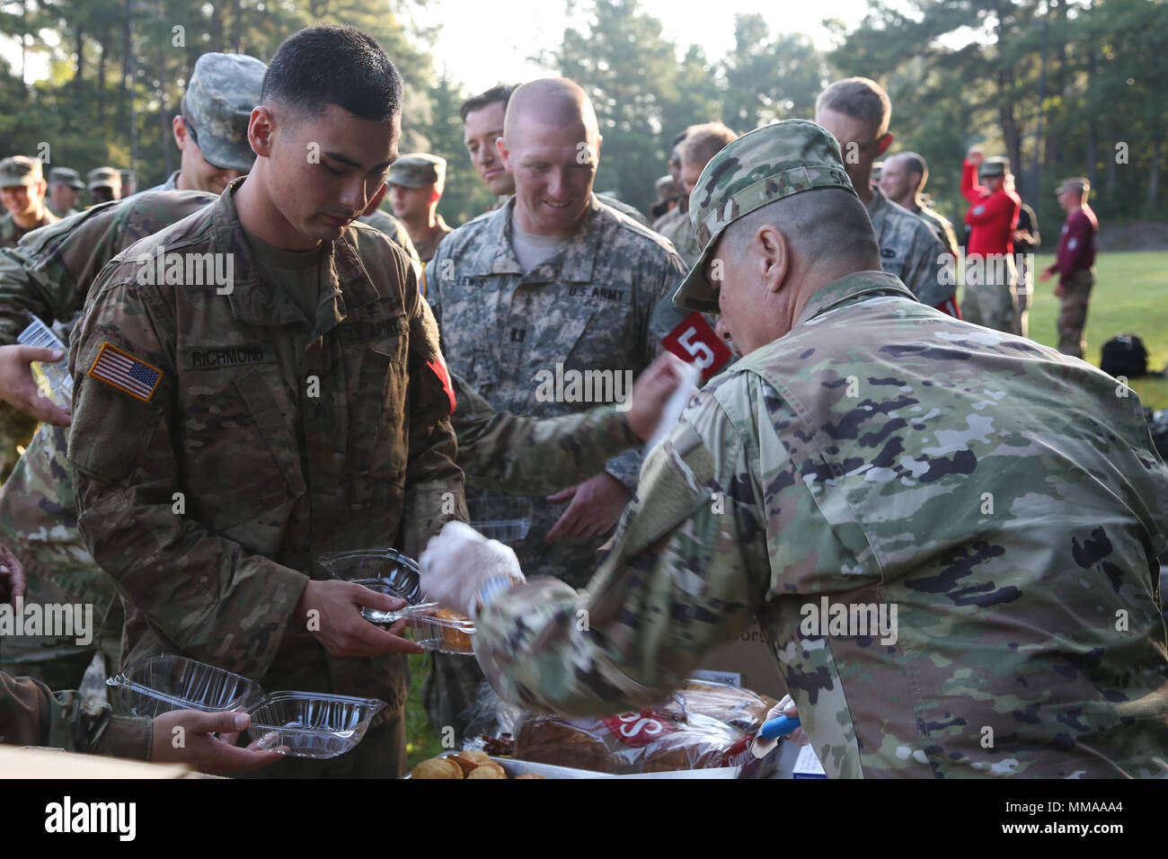 U.S. Army Sgt. Kevin Richmond, assigned to Martin Army Community Hospital, gets served a hot breakfast after the 2017 Best Medic Competition at Fort Bragg, N.C., Sept. 20, 2017. The competition tested the physical and mental toughness, as well as the technical competence, of each medic to identify the team moving forward to represent the region at the next level of the competition.  (U.S. Army photo by Pfc. Meleesa Gutierrez) Stock Photo