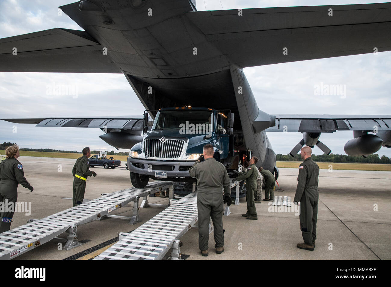 The 179th Airlift Wing along with Airmen from the 178th Wing, Springfield, Ohio, respond to relief efforts needed in Puerto Rico October 4, 2017. The 179th AW sends one of its C-130H Hercules loaded with a Disaster Relief Mobile Kitchen Trailer (DRMKT) with services Airmen from both units. Airmen from both units will use the extremely flexible DRMKT, which supports virtually any field-feeding scenario, form quickly prepared boil-in-the-bag meals to restaurant-quality meals for up to 1,000 people in under 90 minutes. The 179th AW is always ready to respond with a team of trusted Airmen for stat Stock Photo