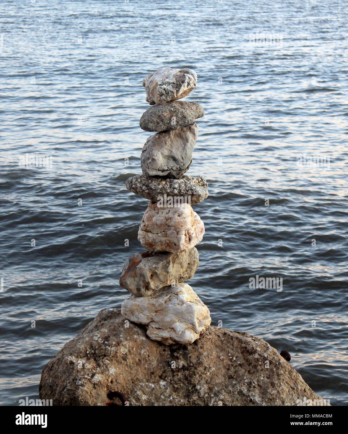 stones balanced on the seashore Stock Photo